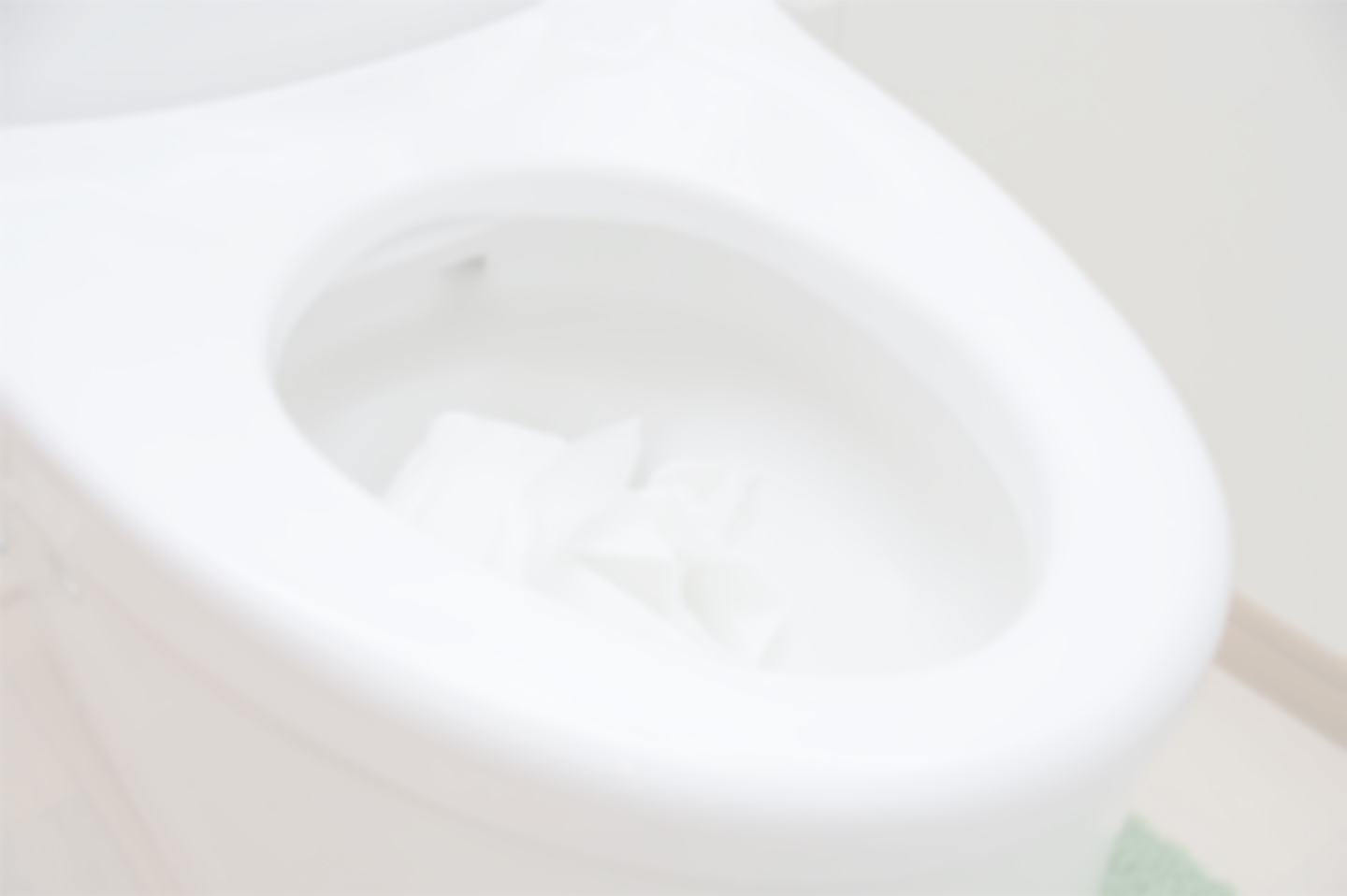 トイレットペーパーが詰まった便器の画像